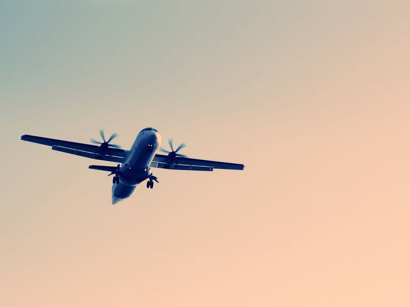 Airplane Flying In The Sky