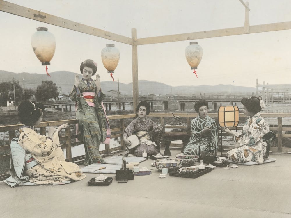 Enjoying The Cool Of A Summer Evening On The Kamogawa In Kyôto