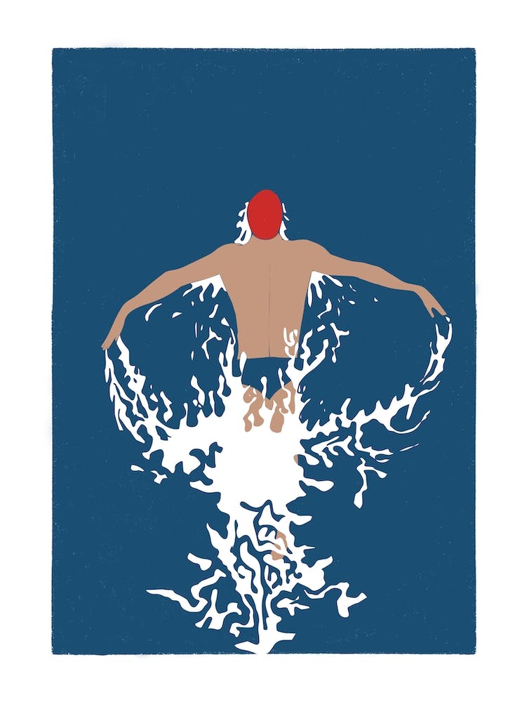 Man butterfly swimming in the ocean