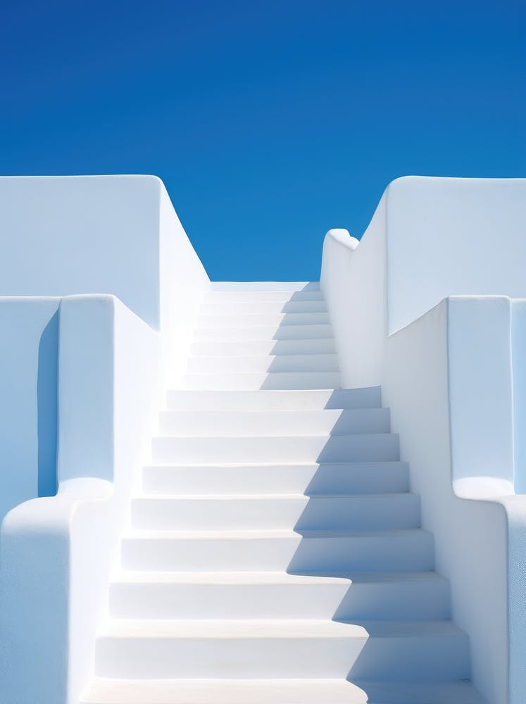 White Stairs Leading To A Blue Sky