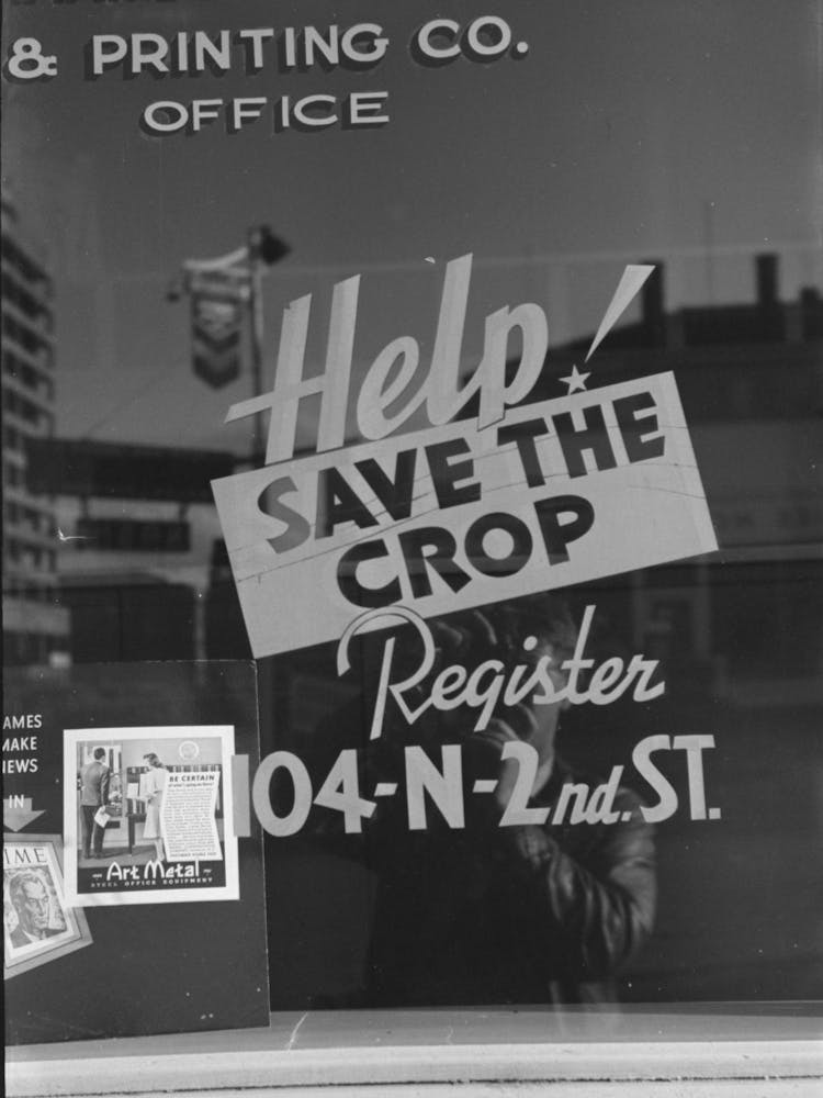 Sign On Store Window In Yakima, Washington, The Crop Referred To Is Hops By Russell Lee