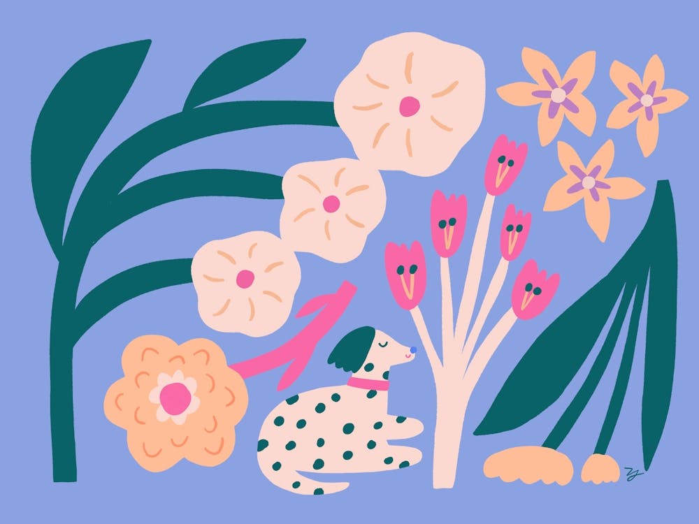 Welpe mit Blumen