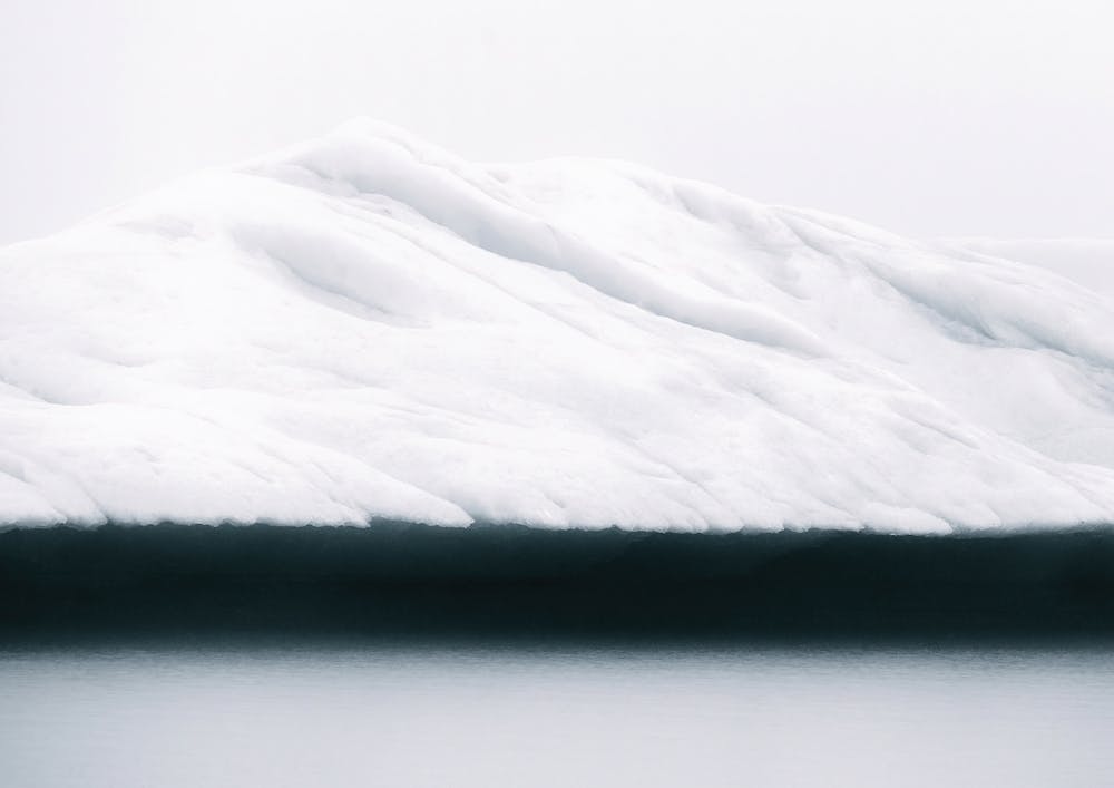 Minimalist Iceberg In The Ocean