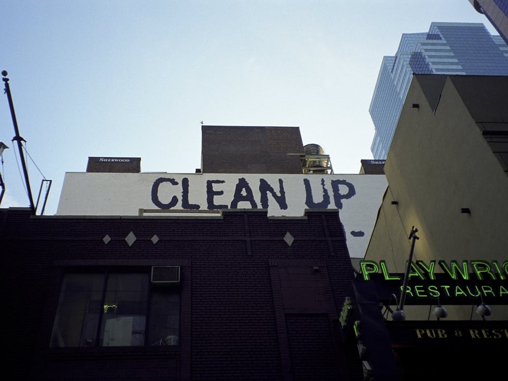Clean Up Sign New York Blue & Brown