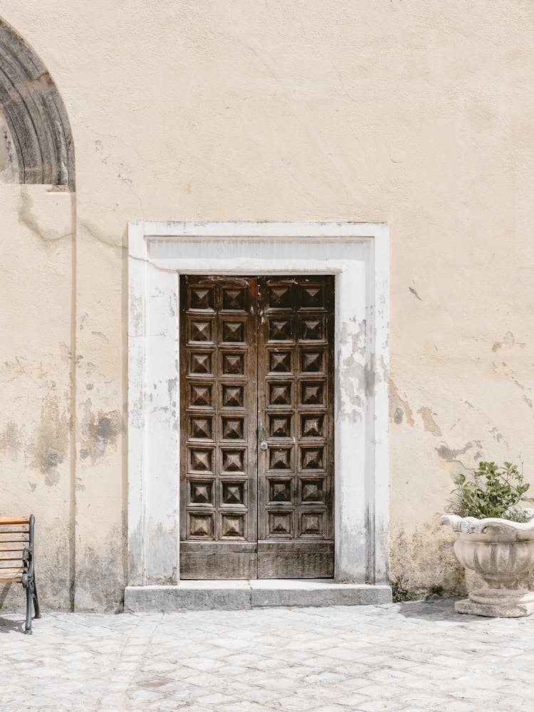 Brown Wooden Door To A Building Somewhere In Italy