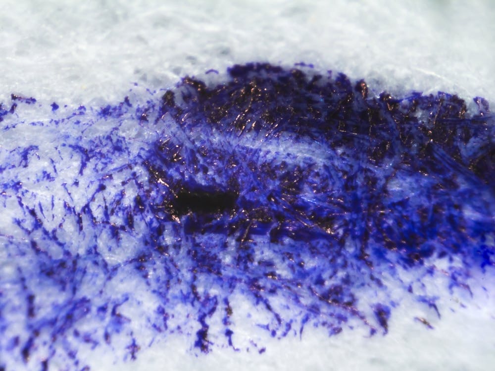 Dripping Blue Ink On Paper Under The Microscope 1