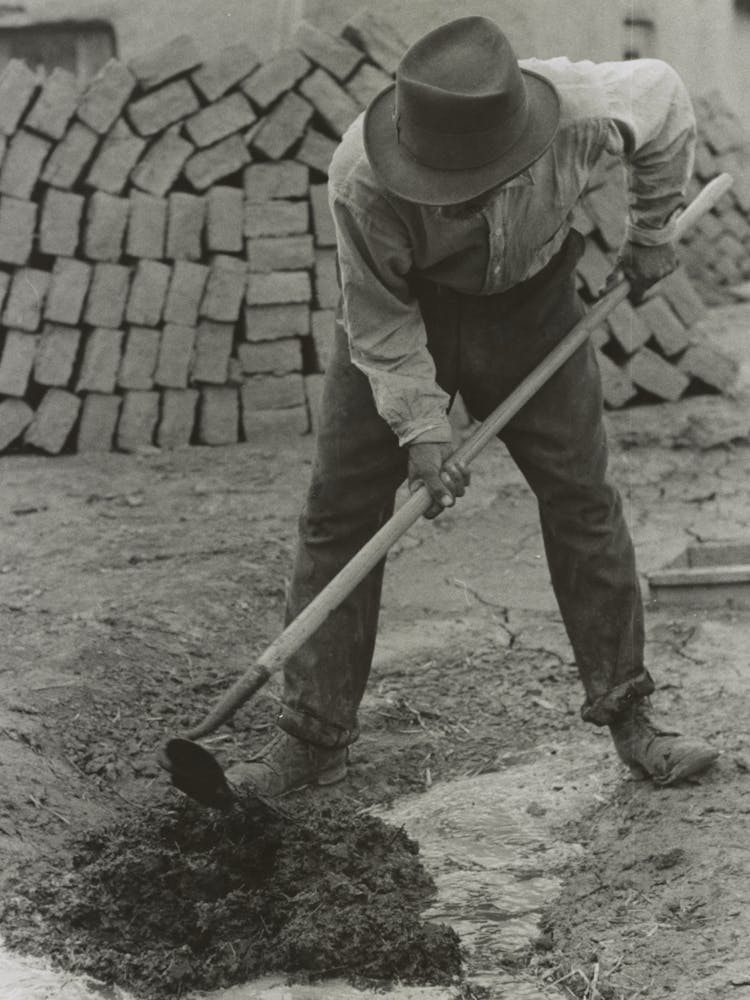 Dirt, Straw And Water Are Mixed To Form The Adobe Mixture For Bricks, Chamisal, New Mexico By Russell Lee