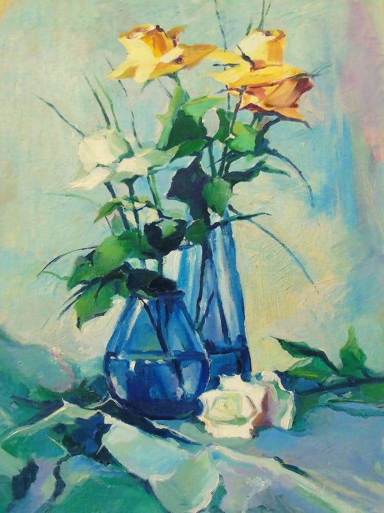 A bouquet of yellow roses in a vase 1