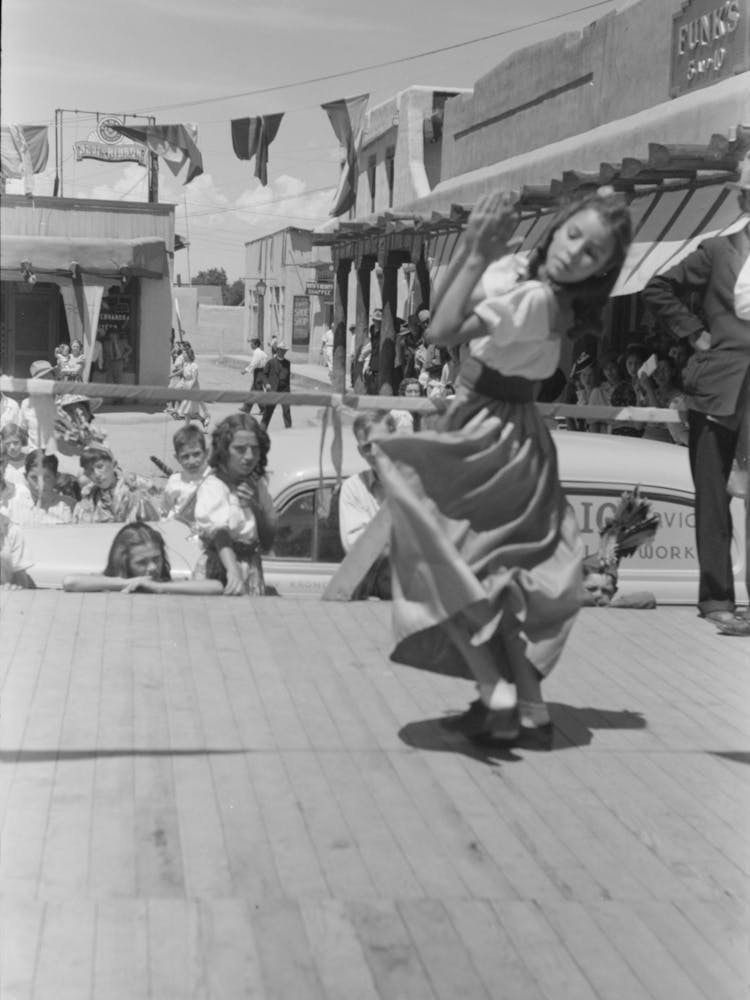Spanish American Girl In Native Dance, Fiesta At Taos, New Mexico By Russell Lee