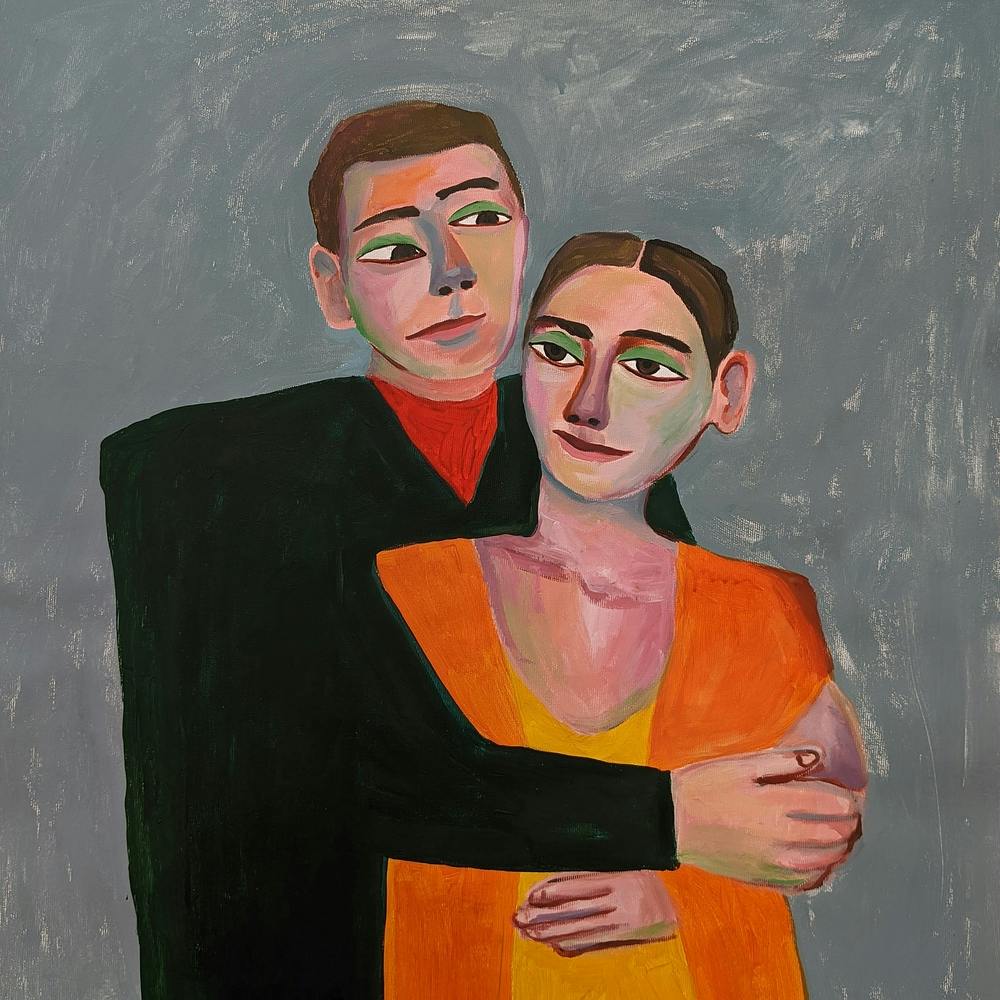 Two people are hugging