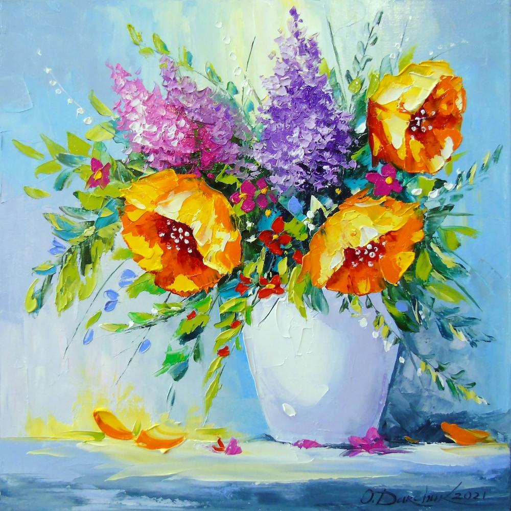 A bouquet of yellow roses in a vase