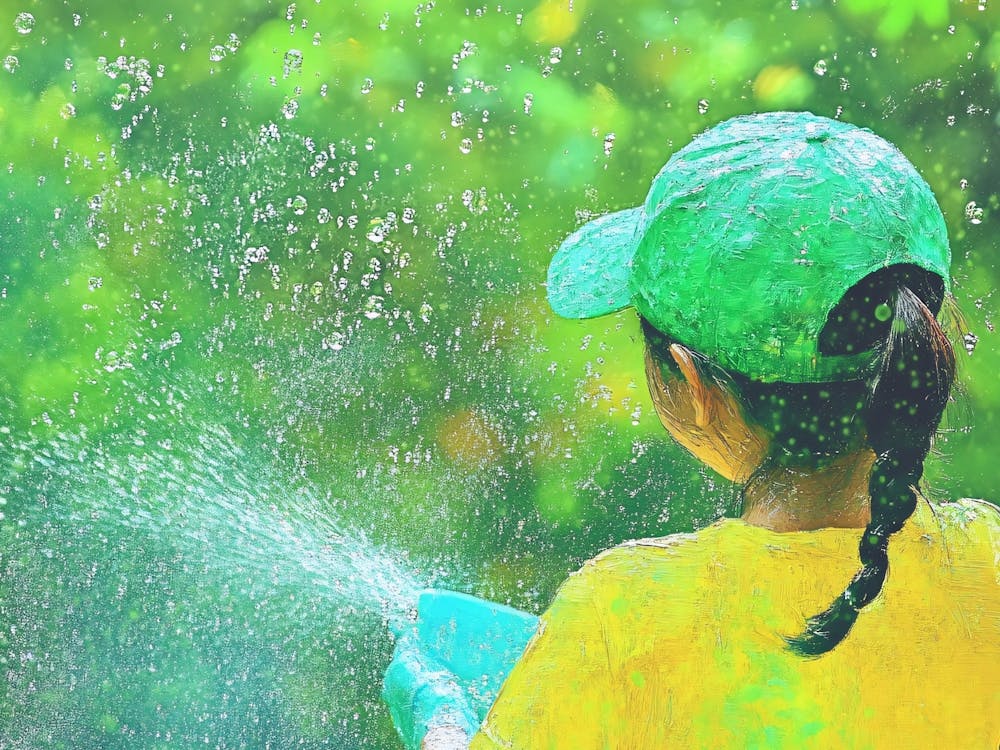 Girl Sprays Water