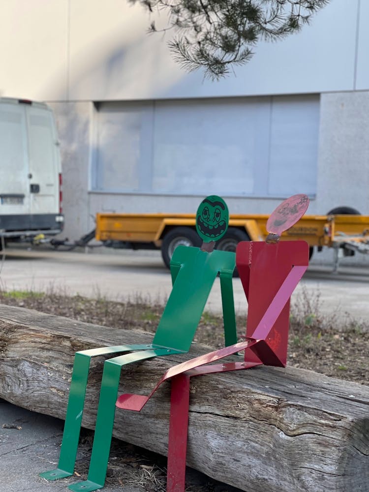 Couple Sitting On A Log