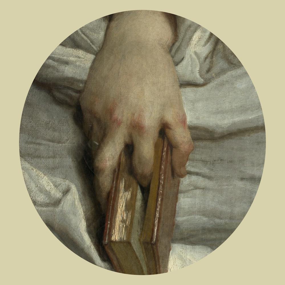 Hand Holding A Book 1