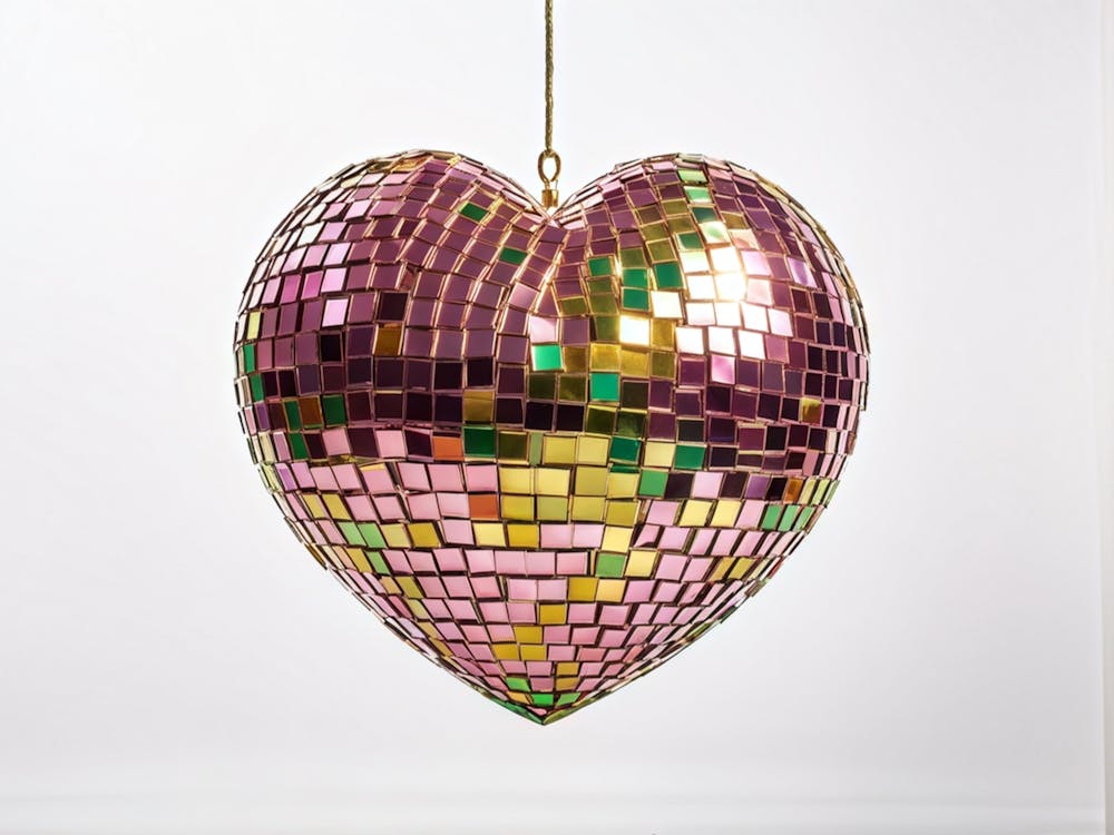 Heart Shaped Disco Ball Crafted In Gold Mesh Intertwining Sparkles Of Pink Orange Purple Green H 1