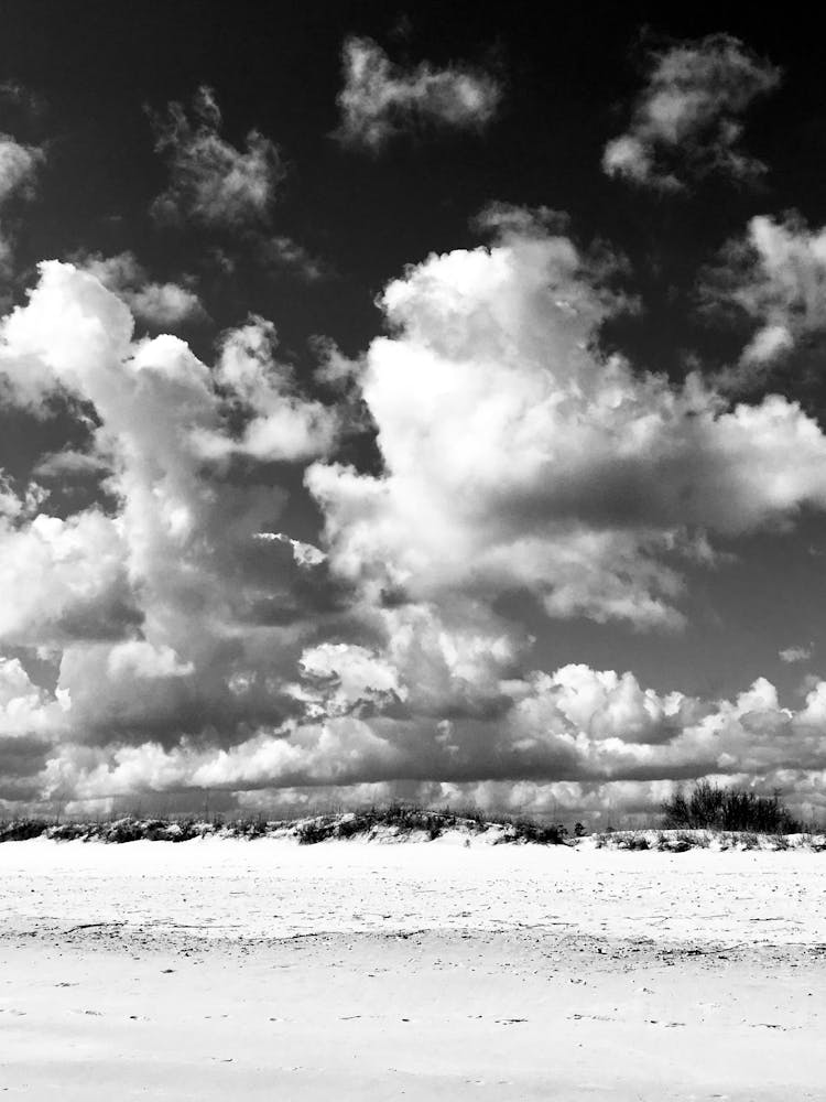 Black And White Clouds over Beach