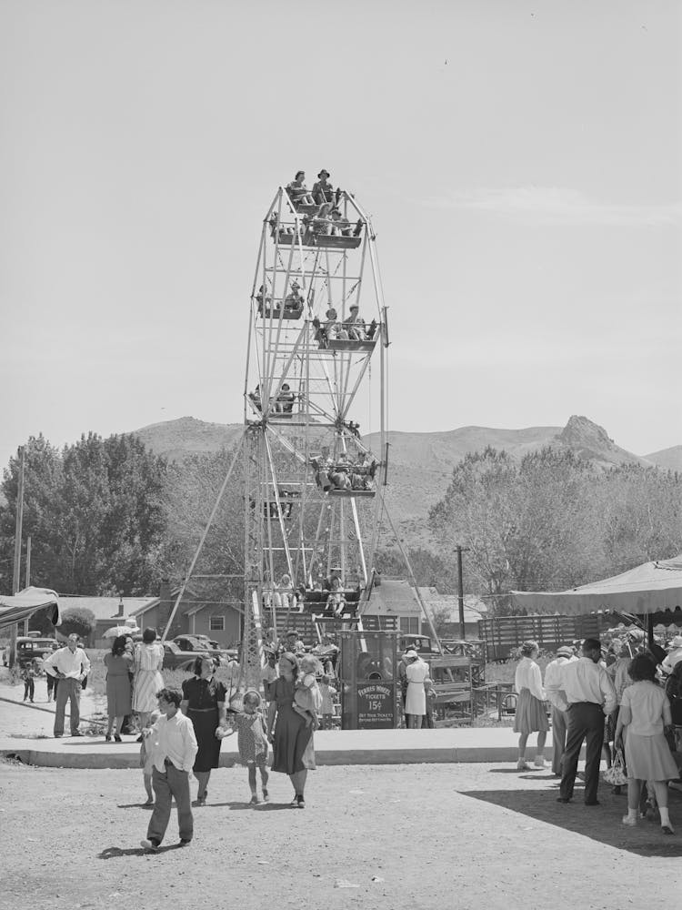Riesenrad, Ein Jahrmarkt war in Vale, Oregon, am Fourth Of July von Russell Lee