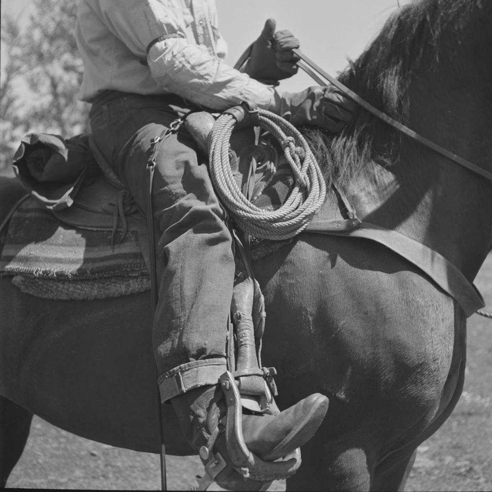 Ola, Idaho, Detail Of Cowboy On Horseback By Russell Lee