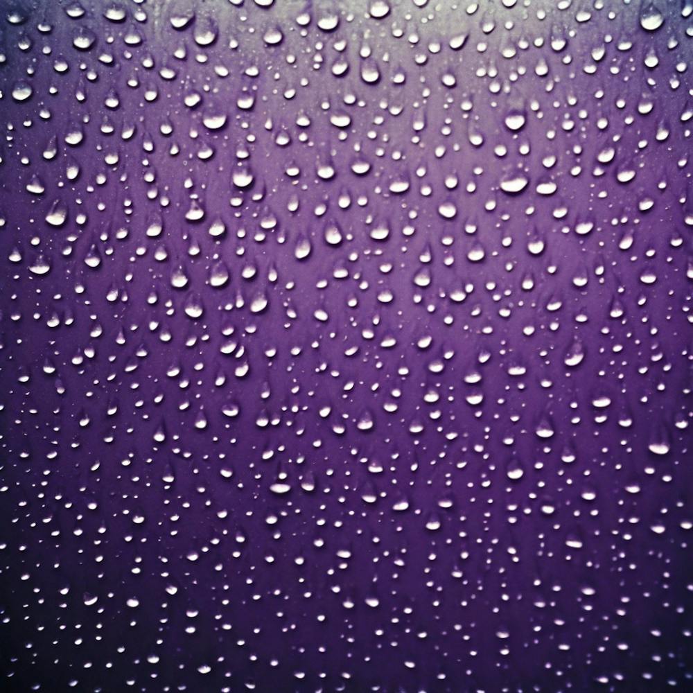 Raindrops On Purple Glass
