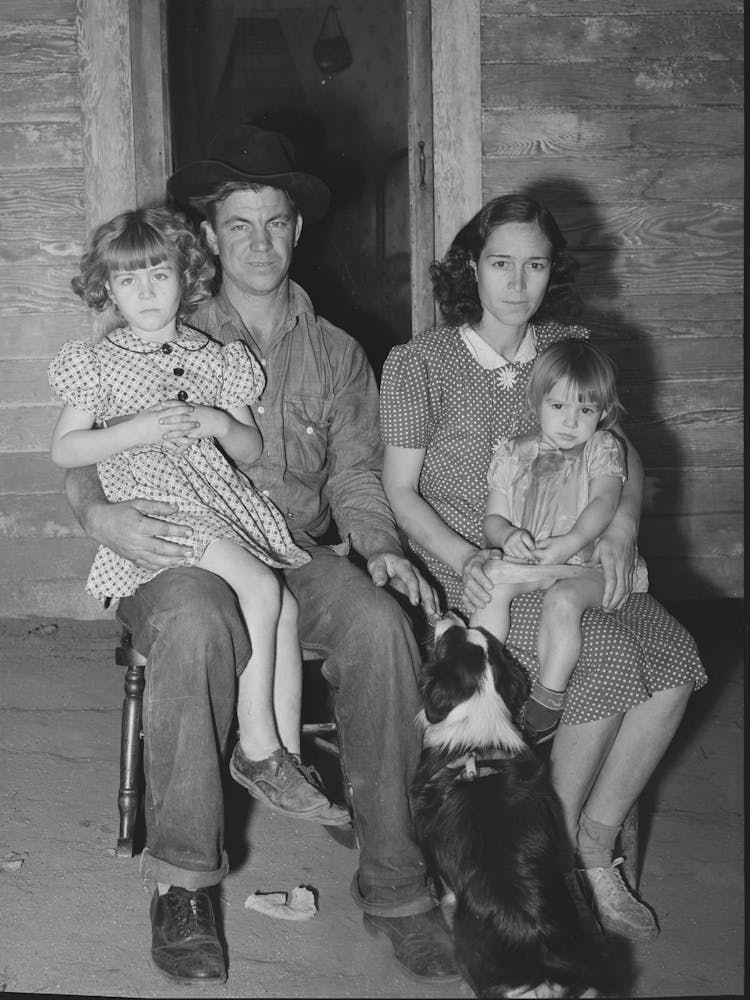 Young Man, His Wife And Children