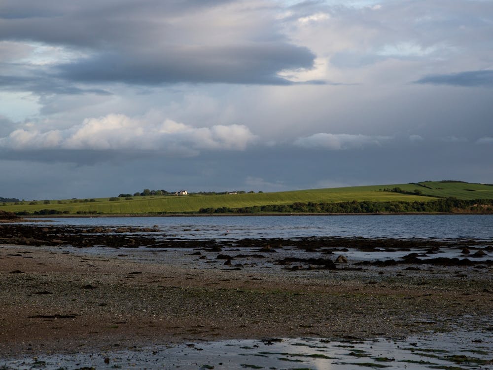 Irish Shoreline Under Clouds