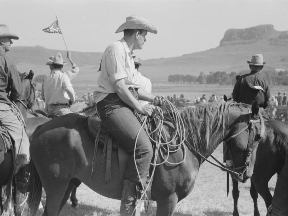 Cowboy At Bean Day Rodeo, Wagon Mound, New Mexico By Russell Lee