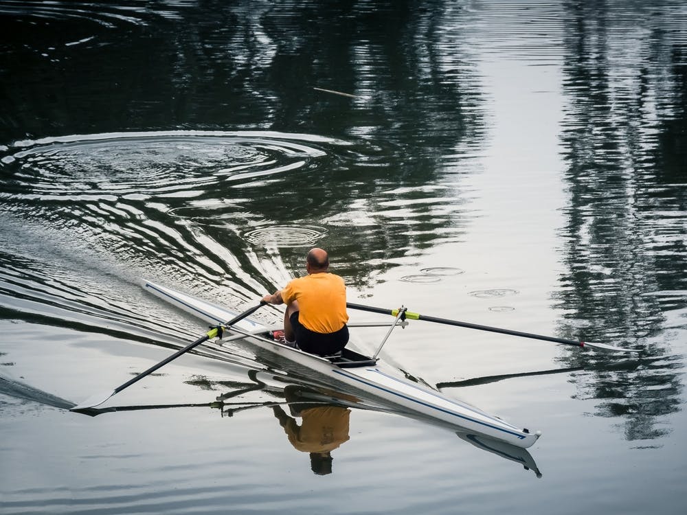Man Sailing With Kayak In The River