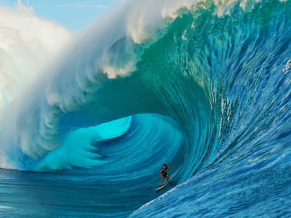 Surfer Riding A Wave