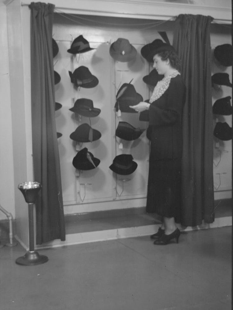 Untitled Photo, Possibly Related To Model Trying On Hat For A Buyer, New York City Showroom, Jersey 2