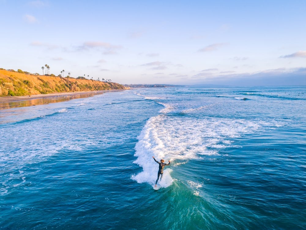 Surfer Riding Wave Backwards