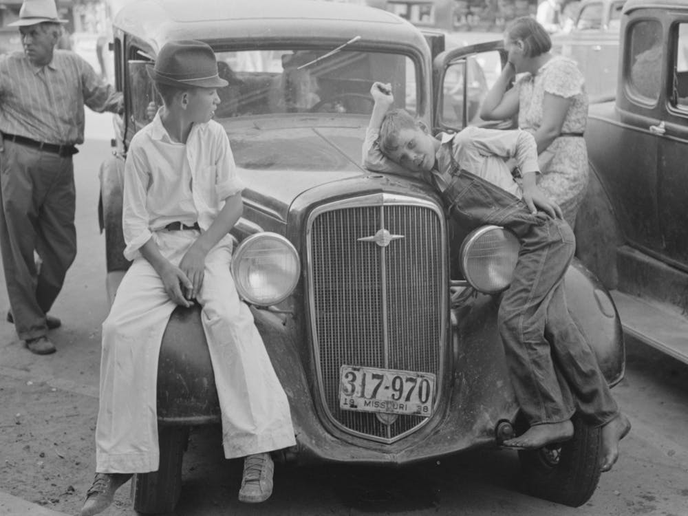 Children Sitting On Fenders Of Car, Steele, Missouri By Russell Lee