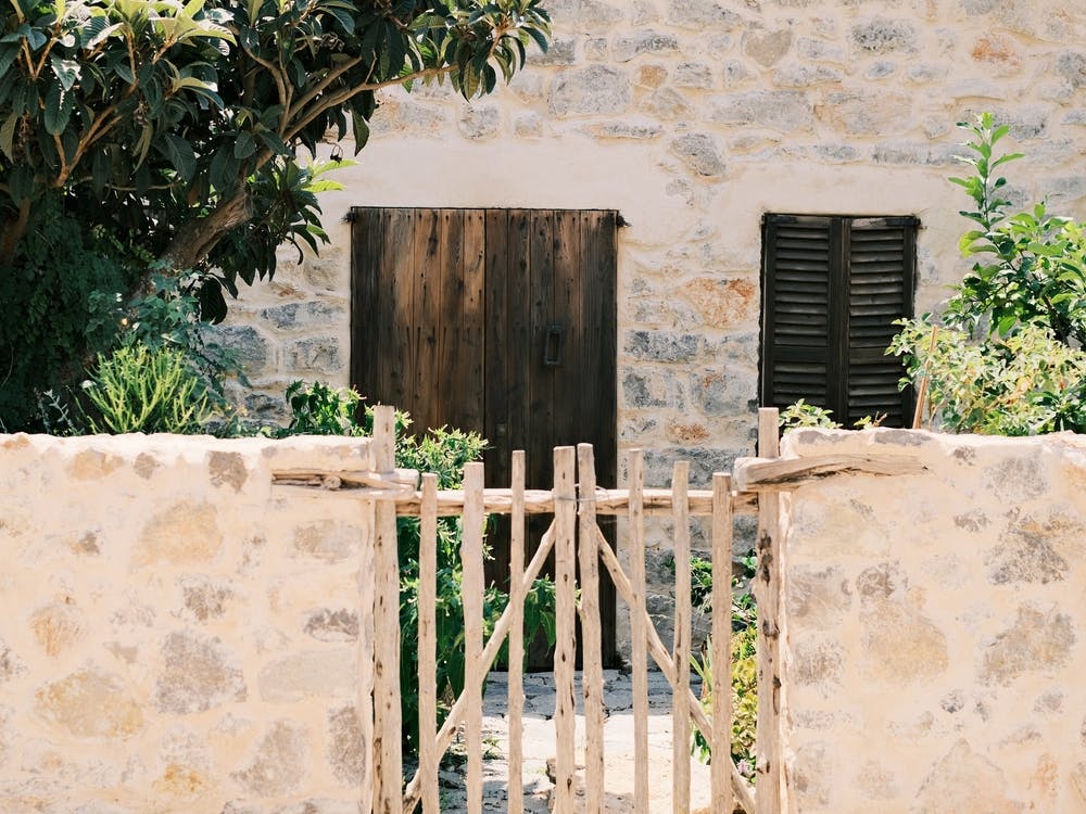 Ibiza garden& House with brown door // Ibiza Travel Photography