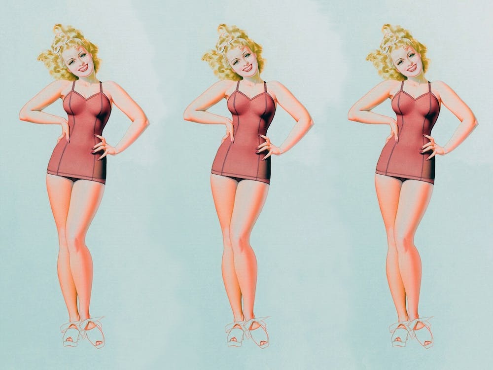 Retro Woman Trio Wearing Vintage Swimwear