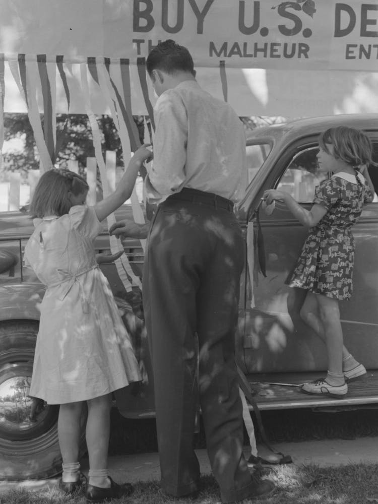 Untitled Photo, Possibly Related To Decorating Their Automobile For The Fourth Of July Parade At Vale, Oregon