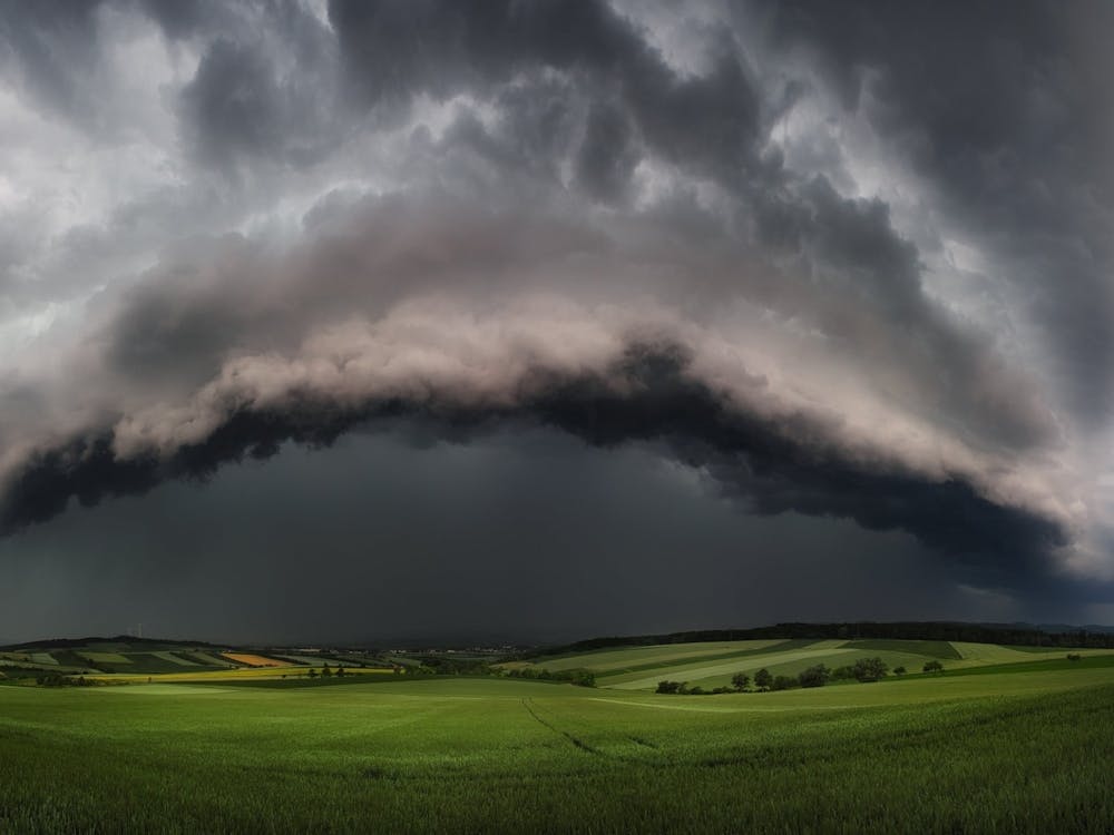 Storm Clouds Over A Field