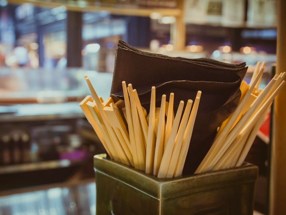 Many Chopsticks Inside A Box In Restaurant