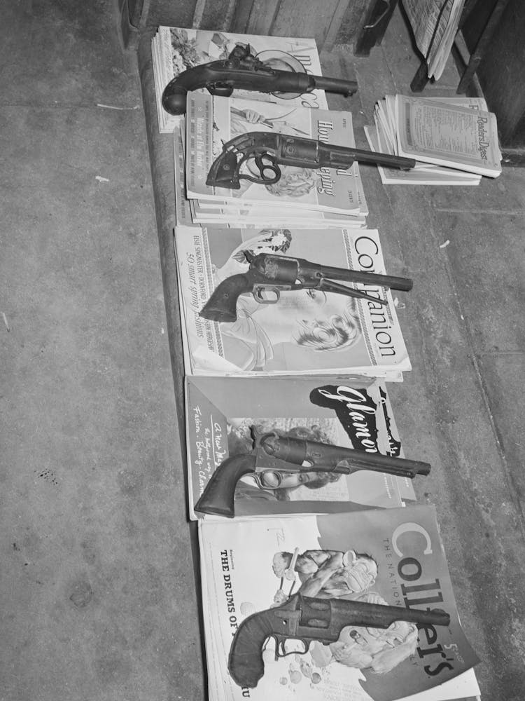 Magazines Weighted Down With Pistols, Drugstore, Gonzales, Texas By Russell Lee