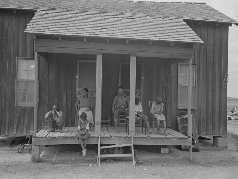 Family Of Fsa (Farm Security Administration) Client Farmer Sharecropper On Porch Of Old Home