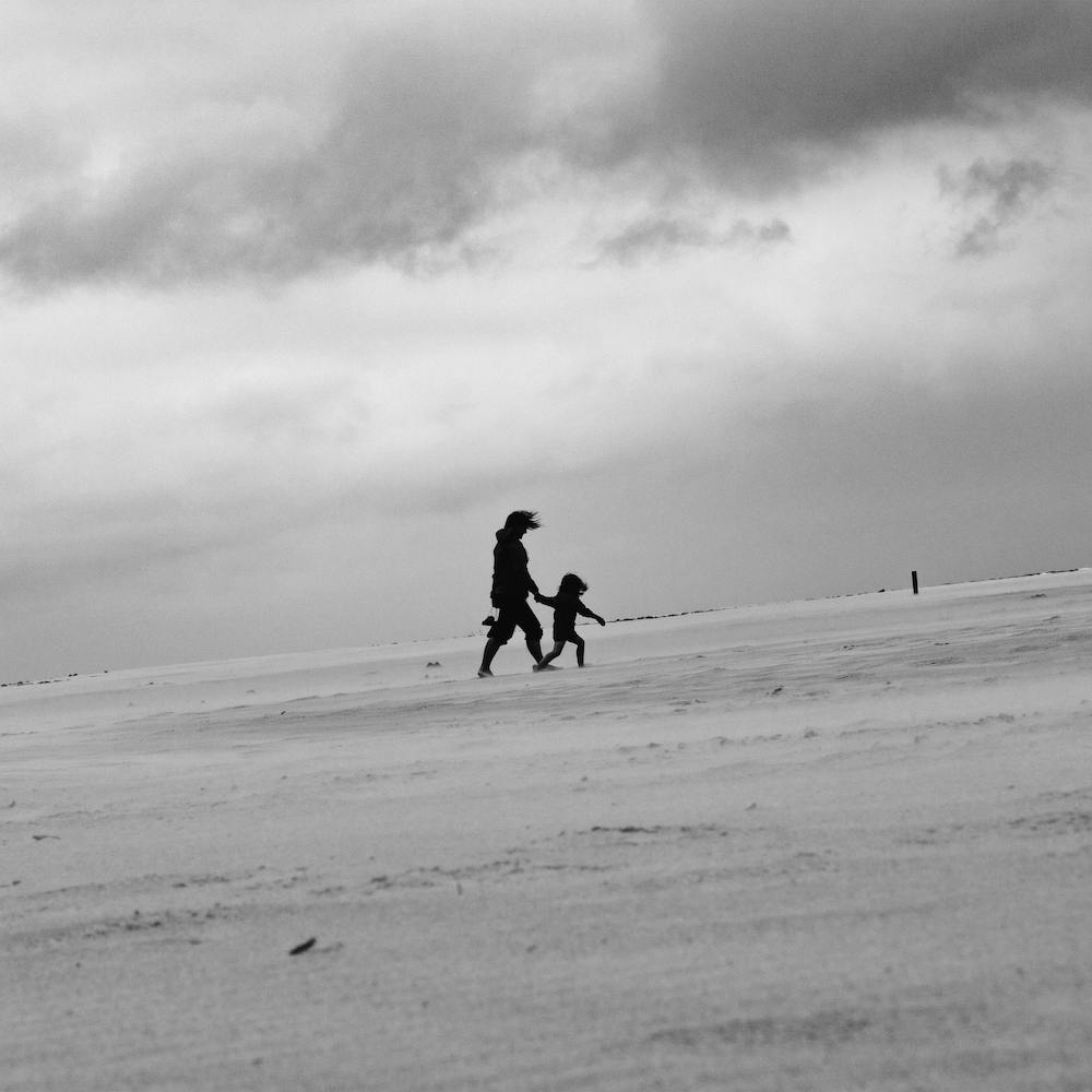 The Mother And Child Blowing On The Beach Texel Netherlands Square