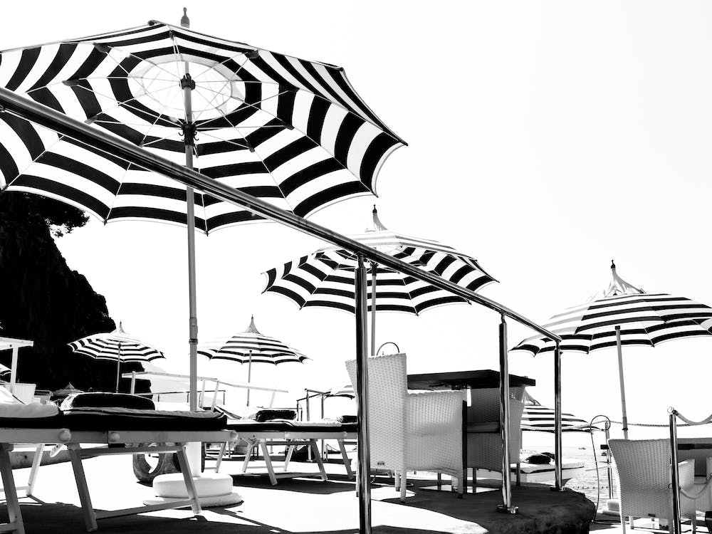 Amalfi Coast Beach Club | Positano Italy | Black And White Beach Umbrellas 