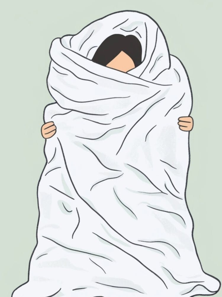 Person Wrapped In A Blanket