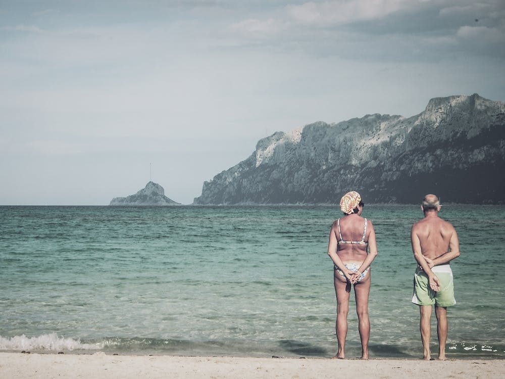 Old Couple On The Beach