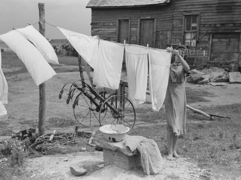 Daughter Of Tenant Farmer Hanging Up Clothes Near Warner, Oklahoma By Russell Lee 1