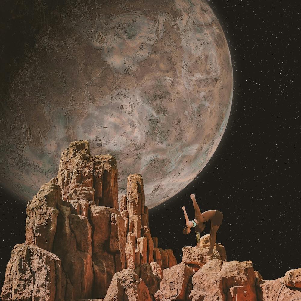 Woman On A Rock In The Desert