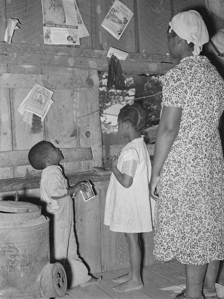 Wife Of Sharecropper Teaching Her Children Their Abcs, Near Marshall, Texas By Russell Lee
