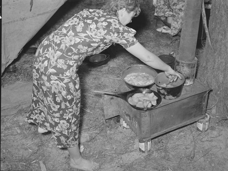 White Migratory Berry Picker Preparing Dinner In Front Of Tent Near Hammond, Louisiana By Russell Lee