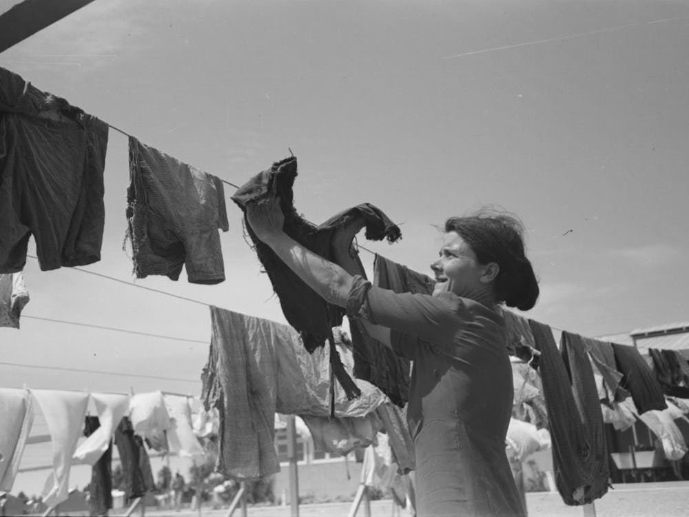 Untitled Photo, Possibly Related To Wife Of Migratory Worker Hanging Up Laundry At The Agua Fria Migratory Labor Cam