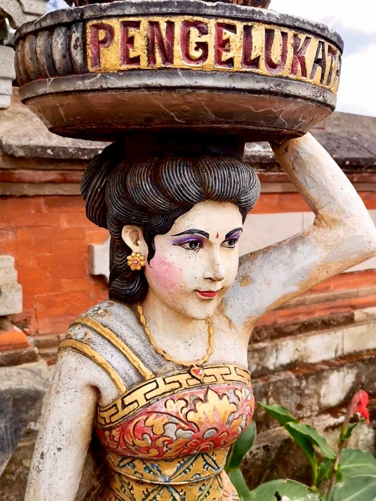 The Woman With The Bucket On The Head