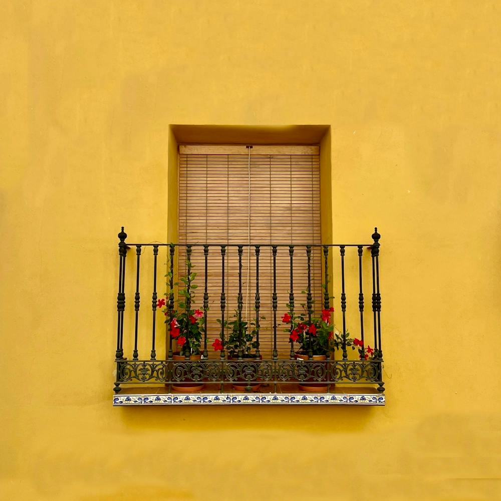 Yellow House With Balcony