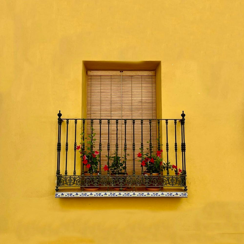 Yellow House With Balcony